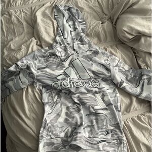 Adidas hoodie brand new never worn and it’s grey and white.